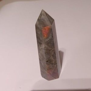 Labradorite point with orange flash 3"